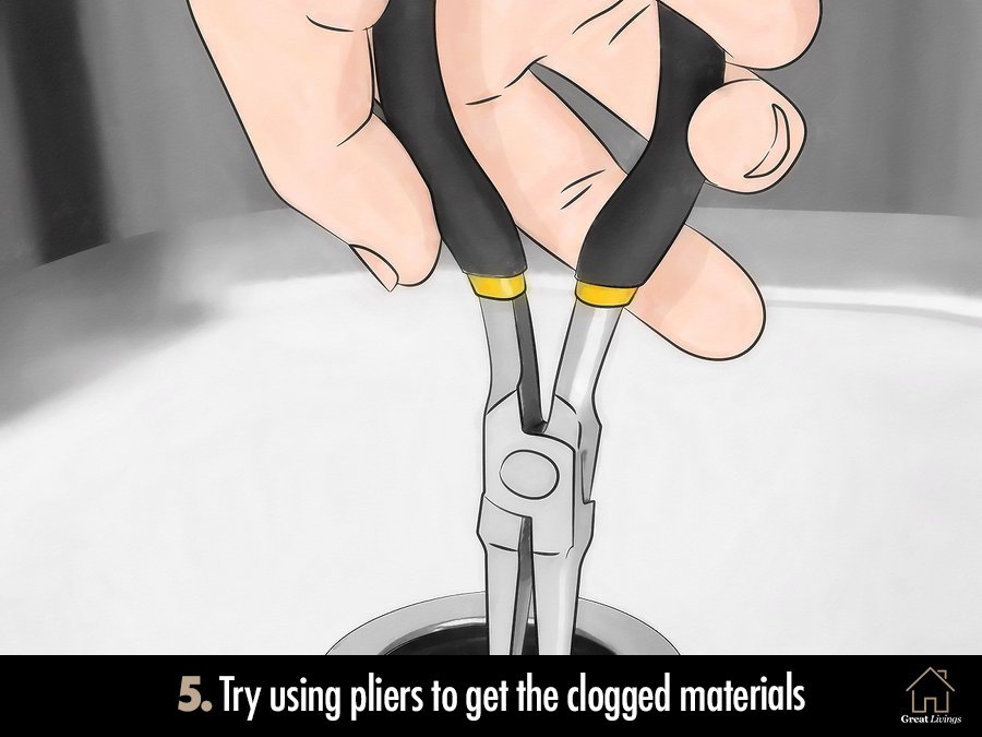 Try using pliers to get the clogged materials